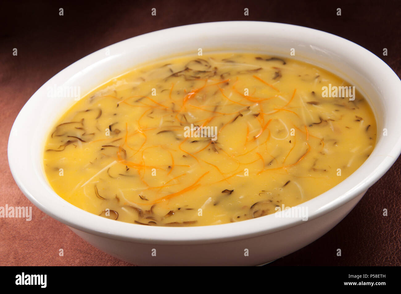 Scallop and abalone soup Stock Photo Alamy