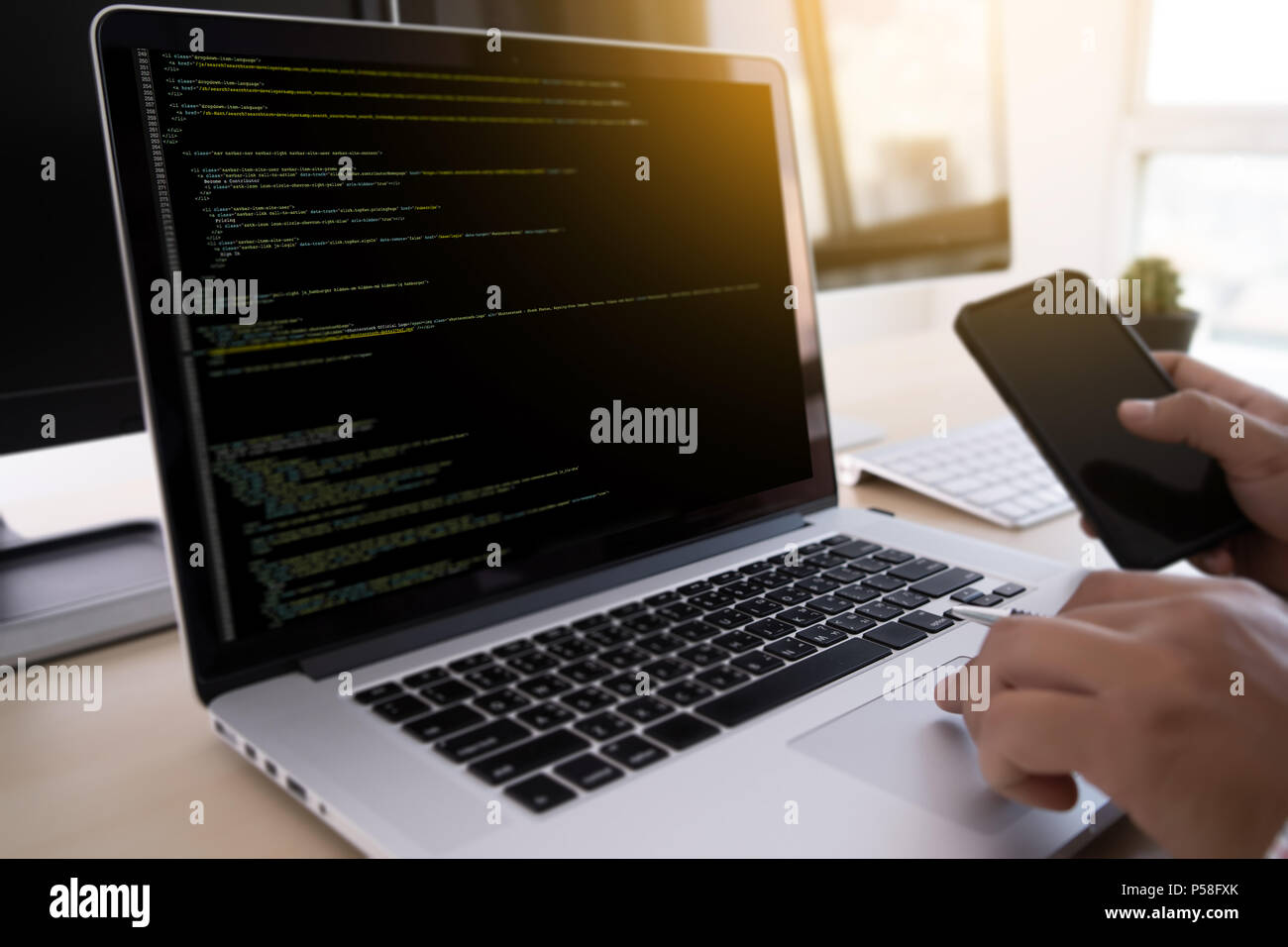 Programmer working Developing programming technologies Web Design Online Technology Stock Photo
