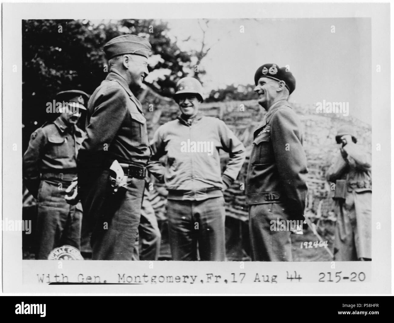 U.S. Generals George Patton & Omar Bradley with British Field Marshall Bernard Montgomery, France, July 7, 1944 Stock Photo