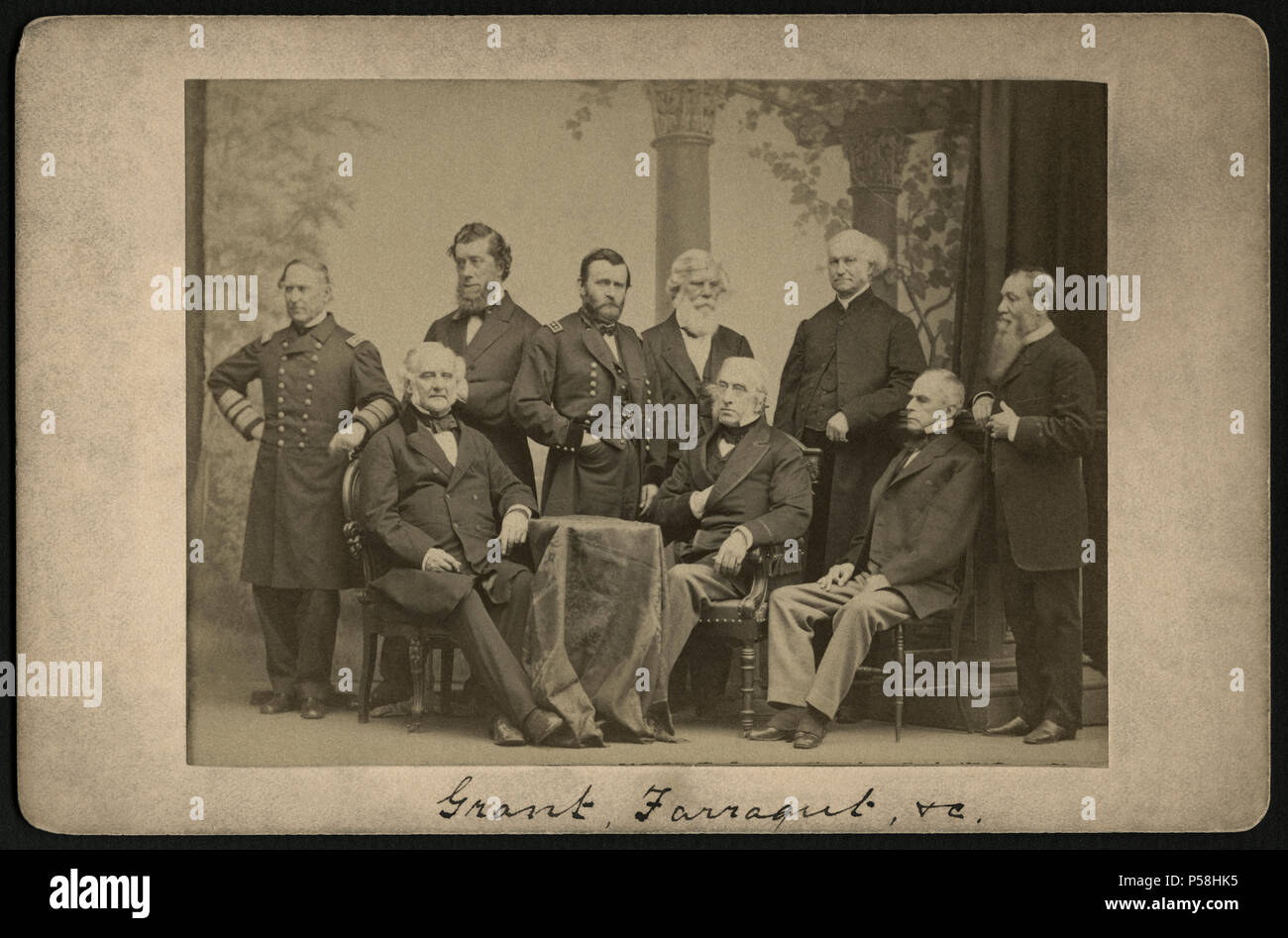 David Farragut (standing left), Ulysses S. Grant (standing center), George Peabody (seated left) with other Union Officers and Statesmen after the end of the American Civil War, Portrait, 1865 Stock Photo