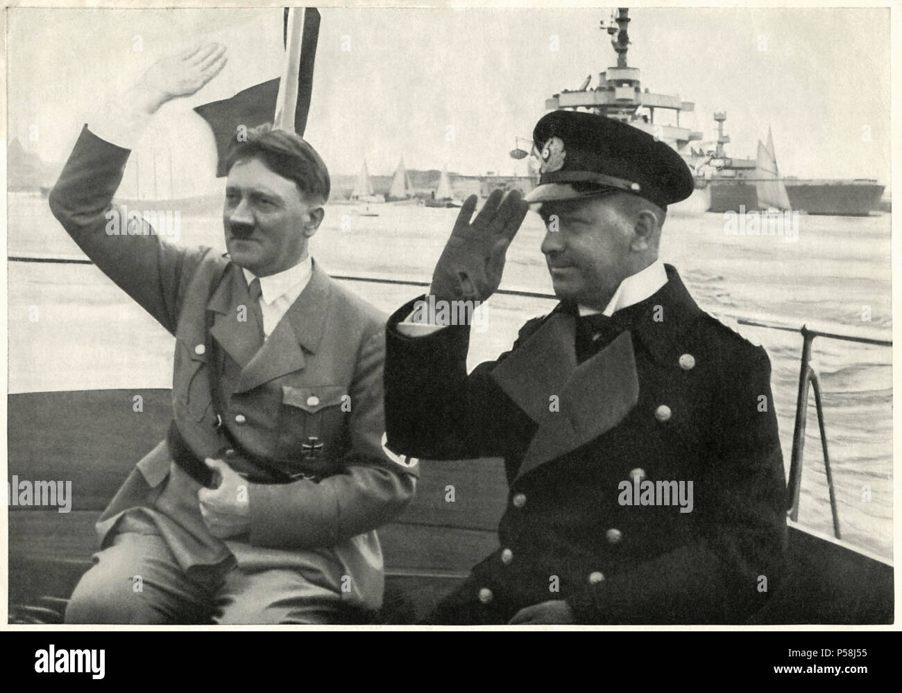 Chancellor Adolf Hitler and Admiral Erich Raeder Reviewing  German Fleet , Germany, 1930's Stock Photo