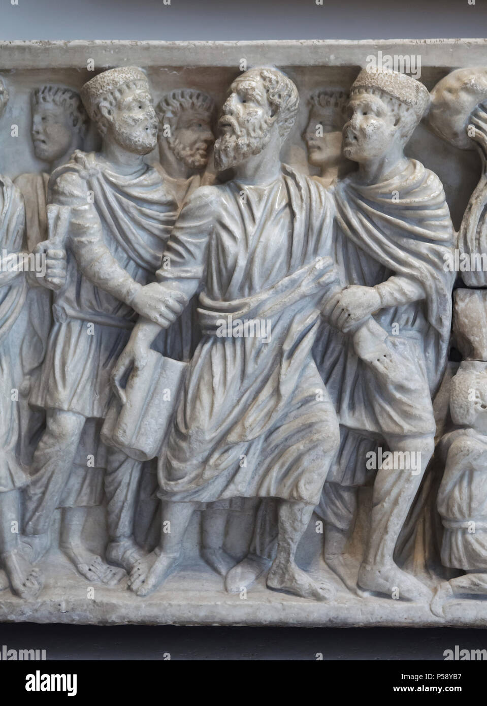 Arrest of Saint Peter. Detail of the Roman marble sarcophagus dated from circa 310 AD from the Astorga Cathedral in León Province on display in the National Archaeological Museum (Museo Arqueológico Nacional) in Madrid, Spain. Stock Photo