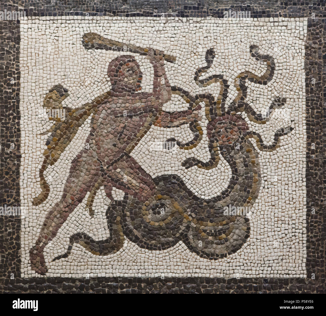 Heracles defeating the Lernaean Hydra. Labours of Heracles depicted in the Roman mosaic dated from the 3rd century AD from Llíria (Valencia Province, Spain) on display in the National Archaeological Museum (Museo Arqueológico Nacional) in Madrid, Spain. Stock Photo