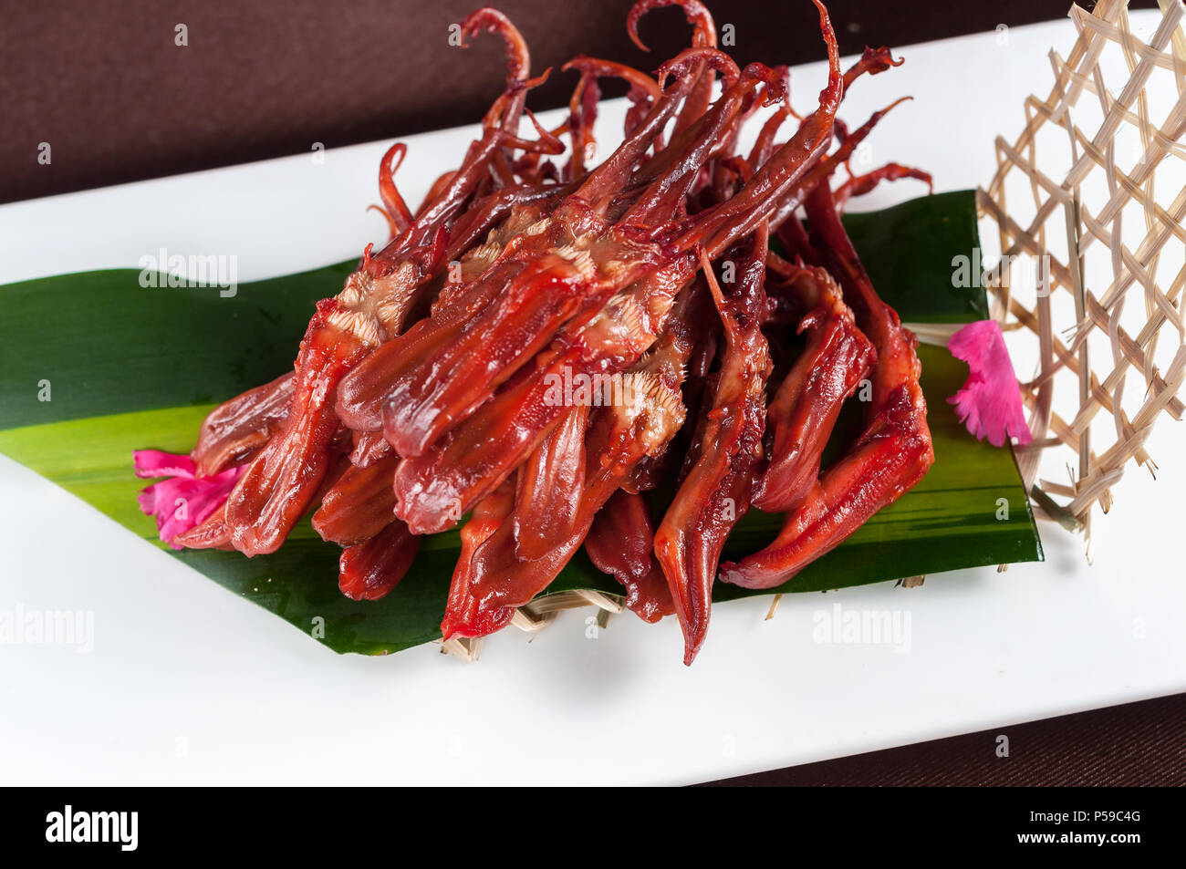 Chinese cuisine, spicy duck tongue Stock Photo Alamy