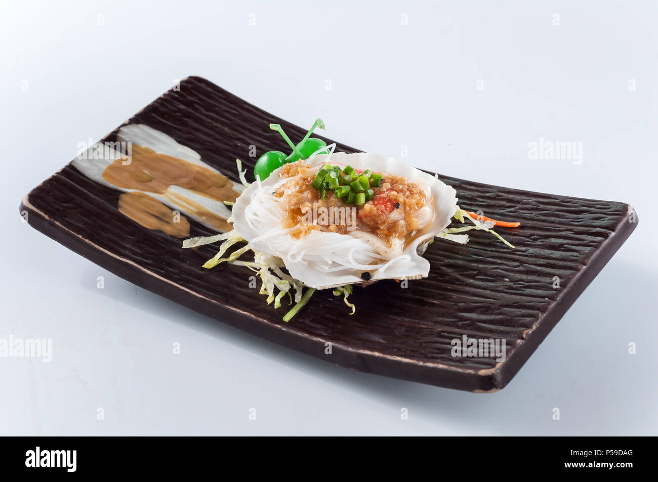 Grilled scallop with garlic, onion, Japanese cuisine Stock Photo Alamy