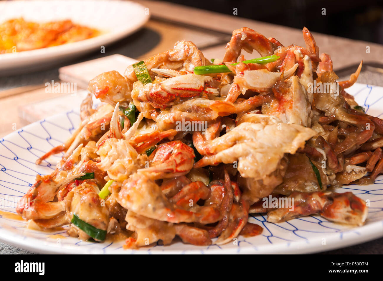 Fried crab with ginger and onion Stock Photo Alamy
