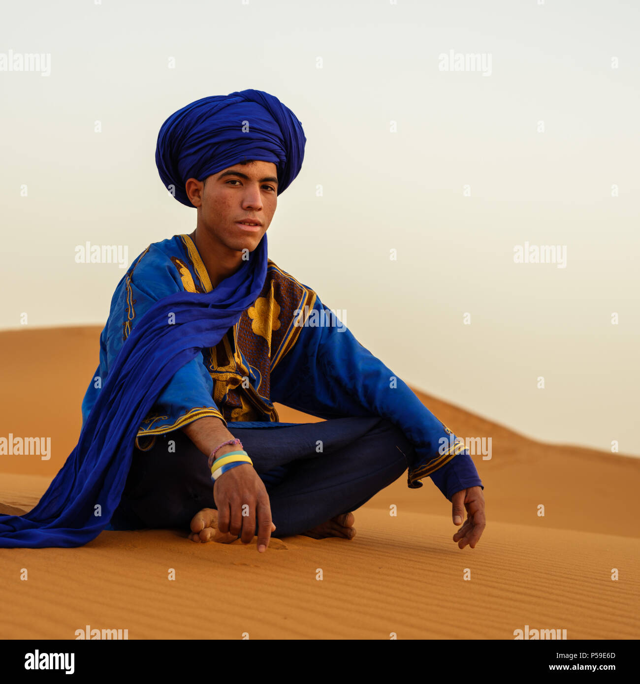 Berber and the dunes of the Sahara Desert in Morocco. Shoot with