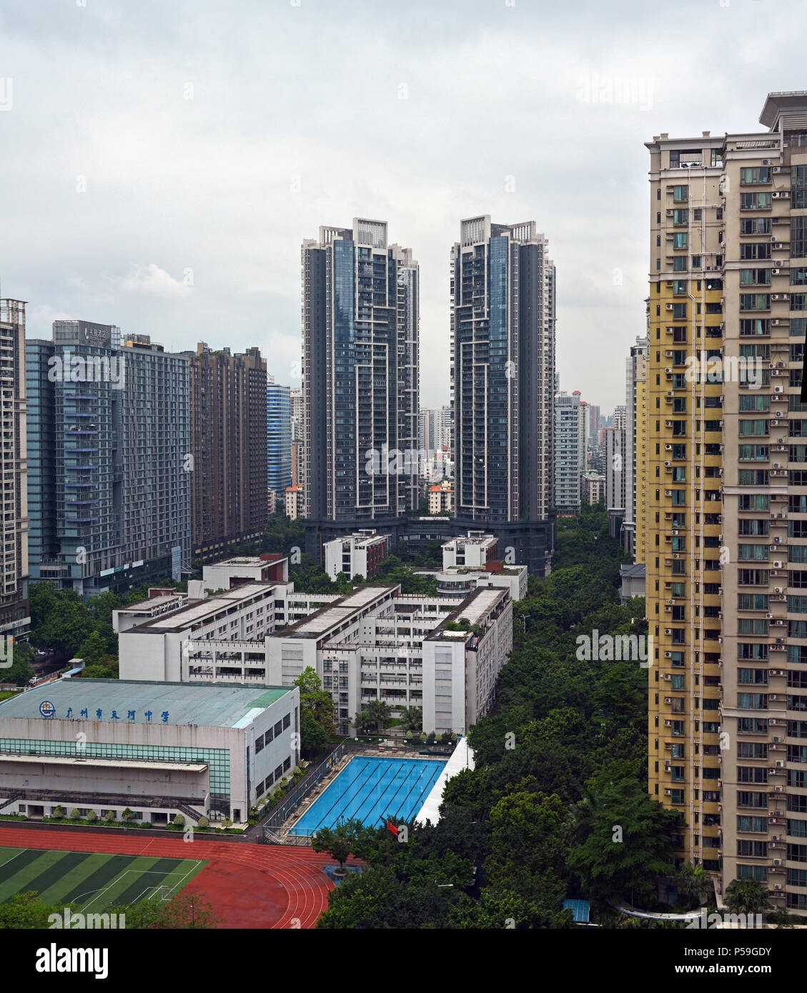 Picture of Guangzhou High Rise Apartments in the New Town, China. Pool, Sports and ...