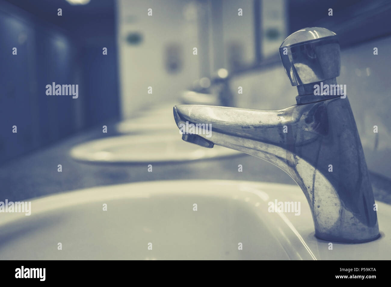 Public toilet and Bathroom interior with white wash basin and sink or