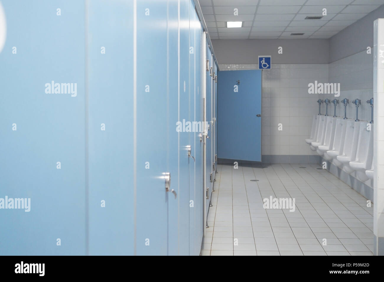 Public toilet and Bathroom interior with white urinals, Closeup of the