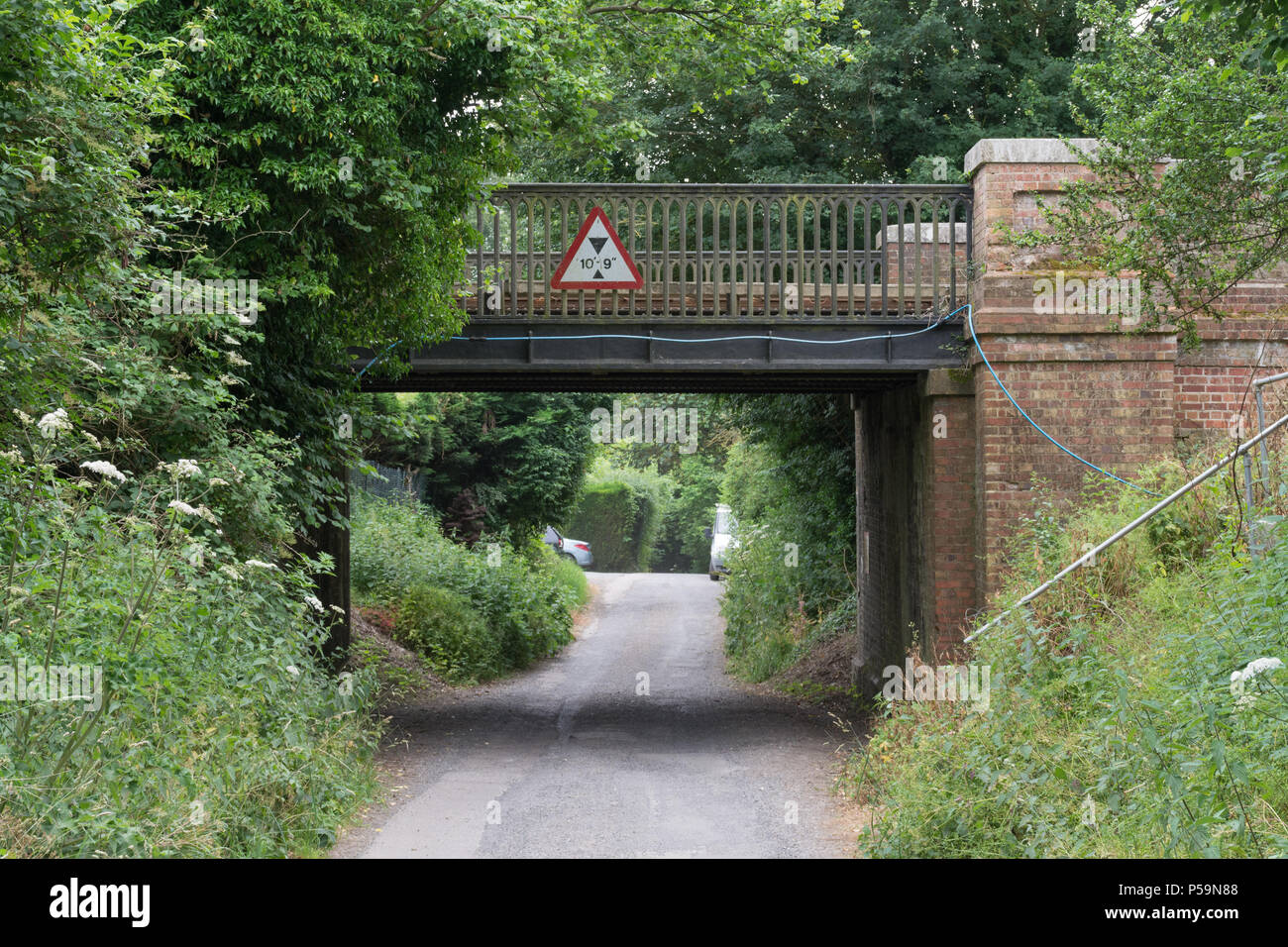 Low bridge sign in Surrey, UK Stock Photo