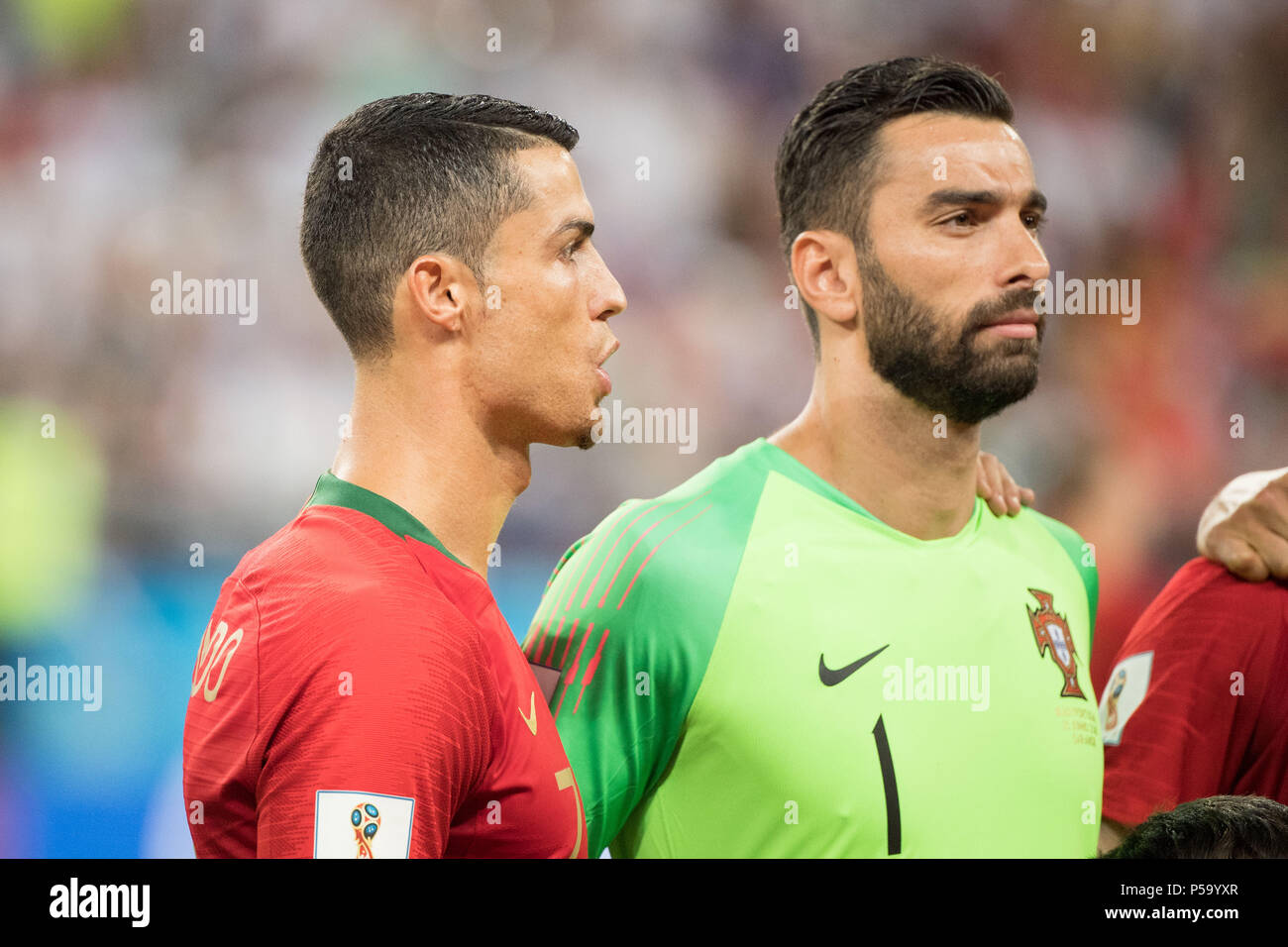 Saransk, Russland. 26th June, 2018. Cristiano RONALDO (l., POR) and goalkeeper Rui PATRICIO (POR) PEPE (l., POR) and Jose FONTE (POR) during the presentation, Prsssentation, line up, lineup, bust, singing, singing, national anthem, Iran (IRN ) - Portugal (POR) 1: 1, Preliminary Round, Group B, Game 35, on 25.06.2018 in Saransk; Football World Cup 2018 in Russia from 14.06. - 15.07.2018. | usage worldwide Credit: dpa/Alamy Live News Stock Photo