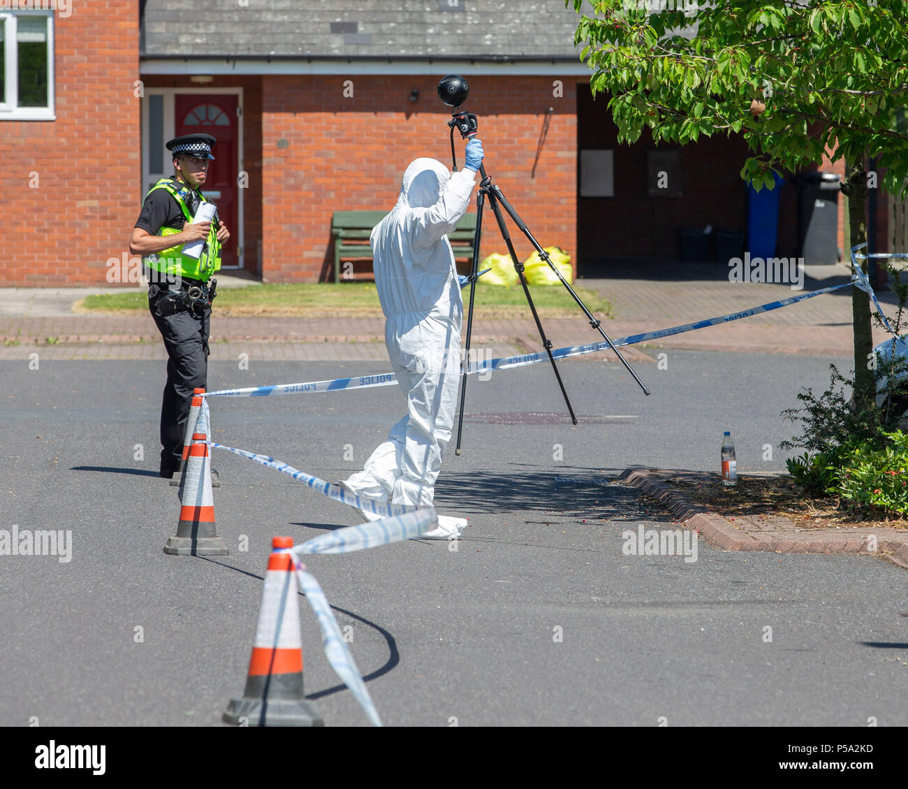 Steven Close, Chapeltown, Sheffield, UK. Friday 26th June 2018 , Steven Close, Chapeltown, Sheffield, UK; The body of a fatally injured man was found in a house in Steven Close, Chapeltown, at 12.30am and a police probe is now under way, The house has been sealed off and is under police guard while forensic experts examine the scene and surrounding streets;CSI officers prepare to enter the property with 3D imagery equipment to map the murder scene Credit: News Images /Alamy Live News Stock Photo