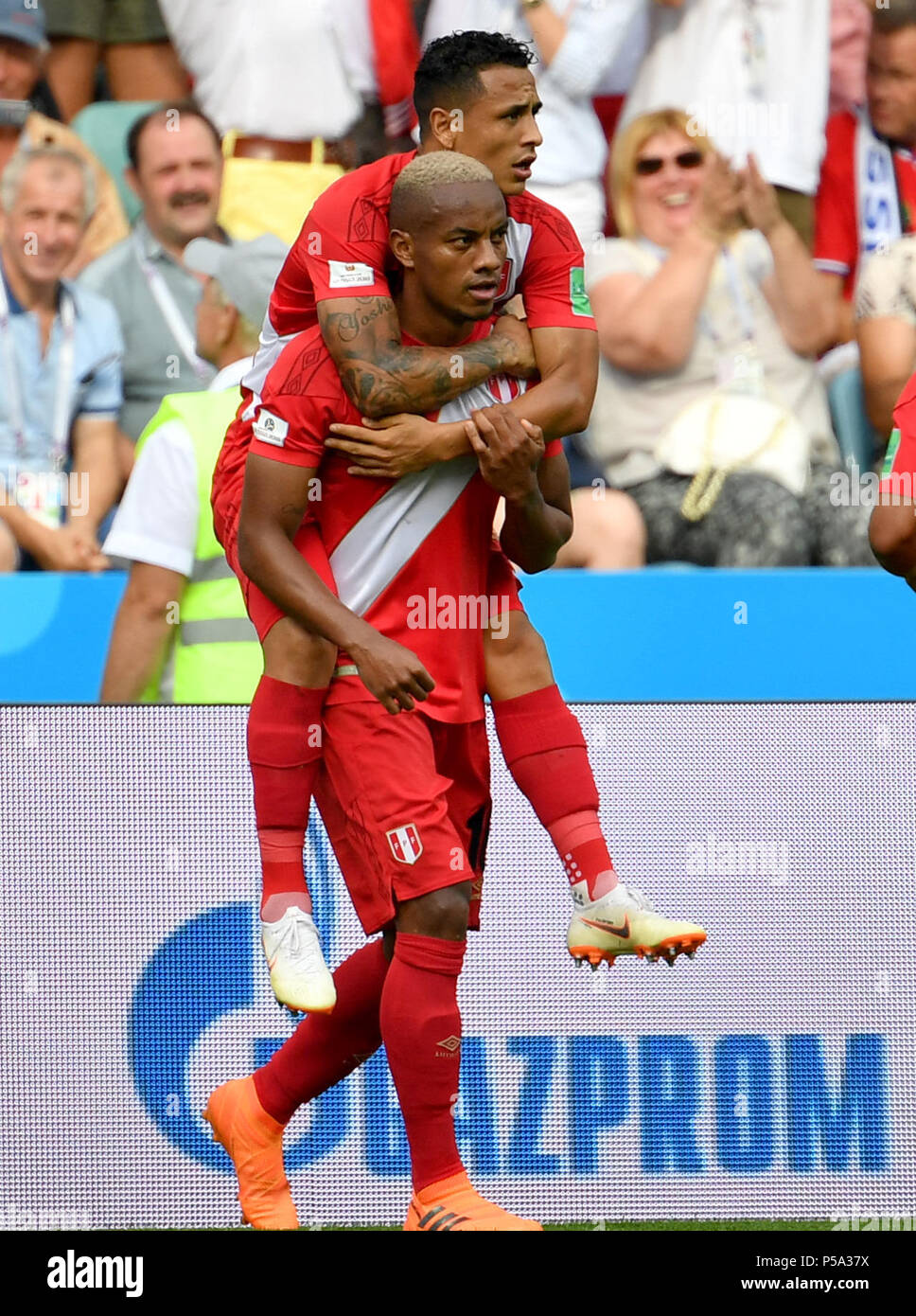 Sochi, Russia. 26th June, 2018. Andre Carrillo (bottom) of Peru celebrates scoring with teammate during the 2018 FIFA World Cup Group C match between Australia and Peru in Sochi, Russia, June 26, 2018. Credit: Chen Cheng/Xinhua/Alamy Live News Stock Photo