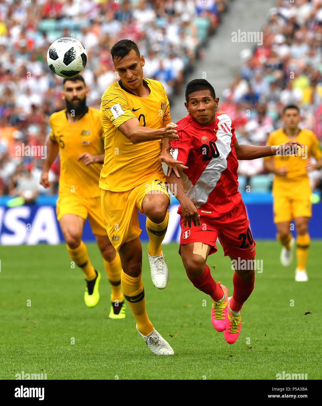 Sochi, Russia. 26th June, 2018. Trent Sainsbury (L front) of Australia vies with Edison Flores (R front) of Peru during the 2018 FIFA World Cup Group C match between Australia and Peru in Sochi, Russia, June 26, 2018. Credit: Chen Cheng/Xinhua/Alamy Live News Stock Photo