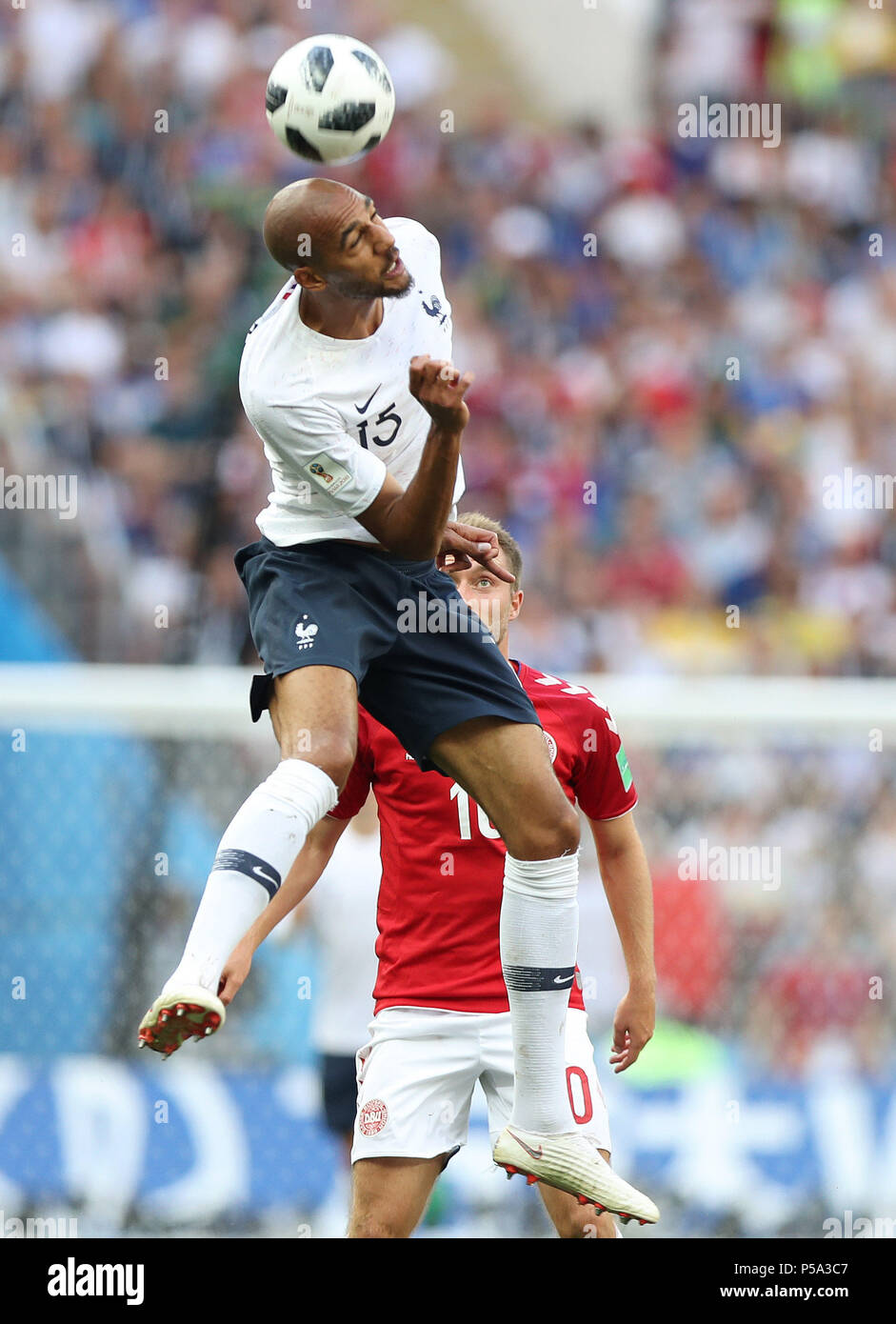 Moscow, Russia. 26th June, 2018. Steven Nzonzi (front) of France competes for a header during the 2018 FIFA World Cup Group C match between Denmark and France in Moscow, Russia, June 26, 2018. Credit: Xu Zijian/Xinhua/Alamy Live News Stock Photo