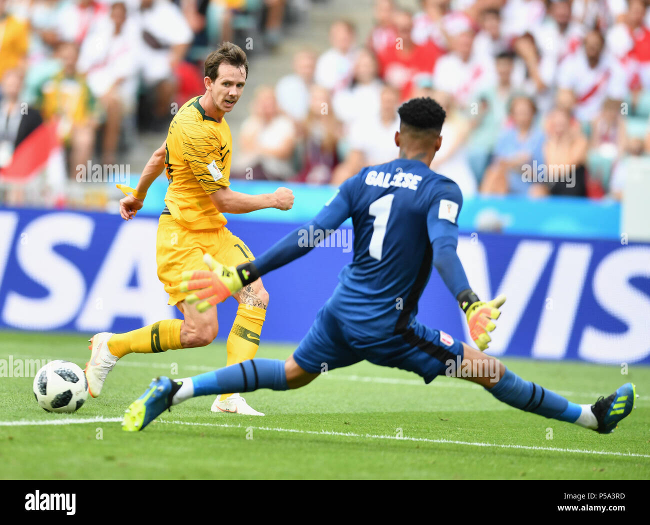 Sochi, Russia. 26th June, 2018. Robbie Kruse (L) of Australia vies with goalkeeper Pedro Gallese of Peru during the 2018 FIFA World Cup Group C match between Australia and Peru in Sochi, Russia, June 26, 2018. Credit: Liu Dawei/Xinhua/Alamy Live News Stock Photo
