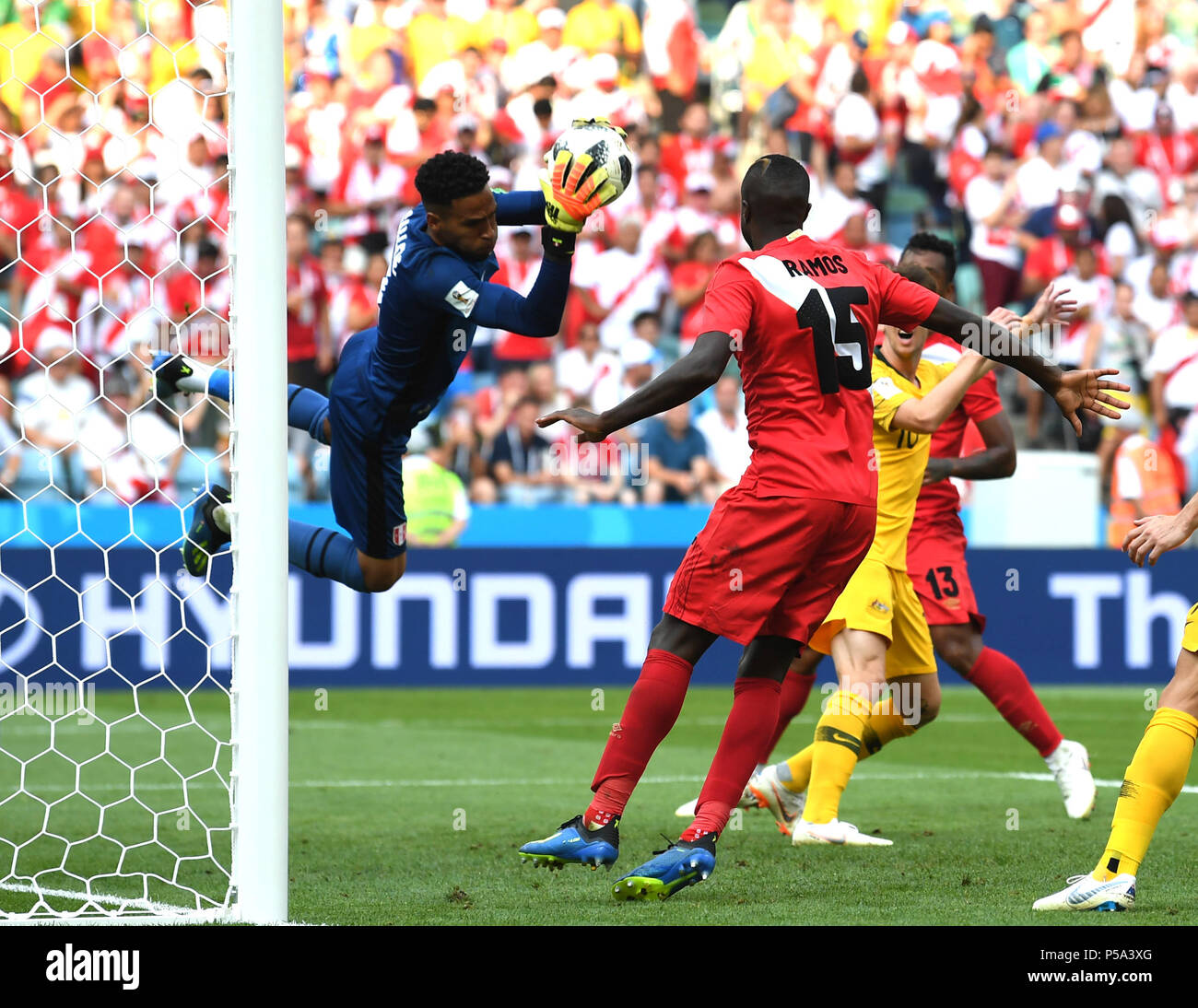Sochi, Russia. 26th June, 2018. Goalkeeper Pedro Gallese (L) of Peru defends during the 2018 FIFA World Cup Group C match between Australia and Peru in Sochi, Russia, June 26, 2018. Credit: Chen Cheng/Xinhua/Alamy Live News Stock Photo