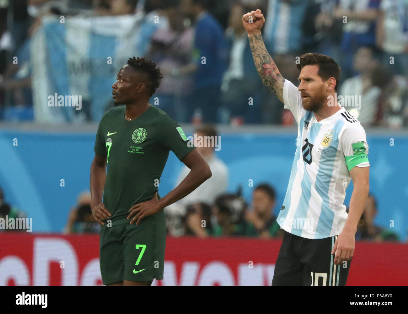 Moscow, Russia. 26th June, 2018. Soccer, World Cup 2018, Preliminary round, Group D, 3rd game day, Nigeria vs Argentina at the St. Petersburg Stadium: Argentina's Lionel Messi celebrates his 0-1 goal beside Nigeria's Ahmed Musa. Credit: Cezaro De Luca/dpa/Alamy Live News Stock Photo