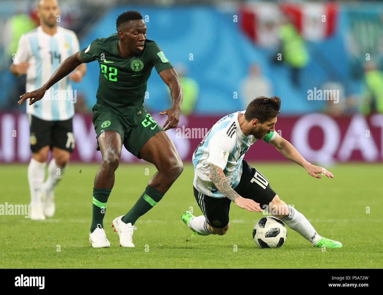 Saint Petersburg, Russia. 26th June, 2018. Lionel Messi (R) of Argentina vies with Kenneth Omeruo of Nigeria during the 2018 FIFA World Cup Group D match between Nigeria and Argentina in Saint Petersburg, Russia, June 26, 2018. Credit: Yang Lei/Xinhua/Alamy Live News Stock Photo