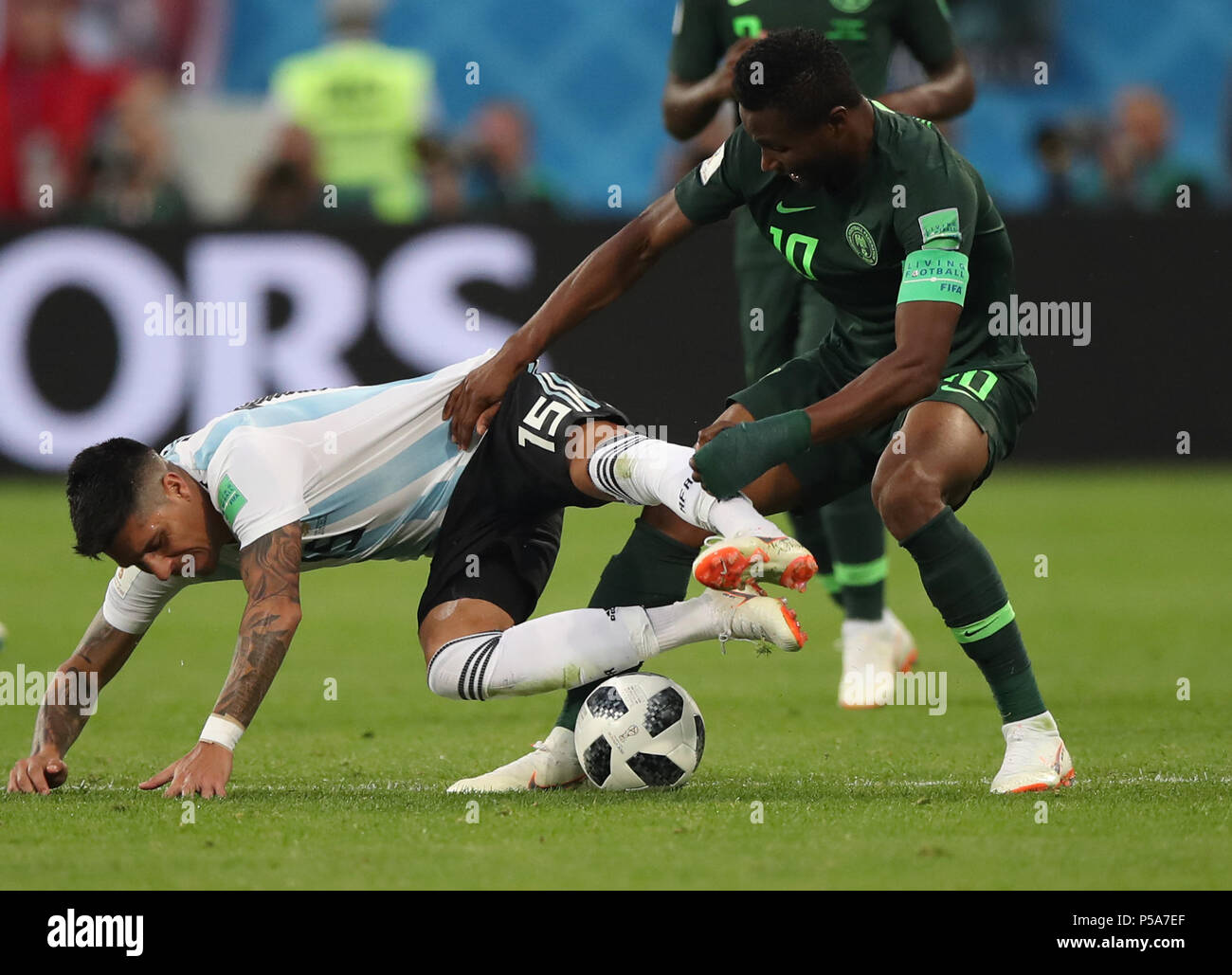 Saint Petersburg, Russia. 26th June, 2018. John Obi Mikel (R) of Nigeria vies with Enzo Perez of Argentina during the 2018 FIFA World Cup Group D match between Nigeria and Argentina in Saint Petersburg, Russia, June 26, 2018. Credit: Wu Zhuang/Xinhua/Alamy Live News Stock Photo