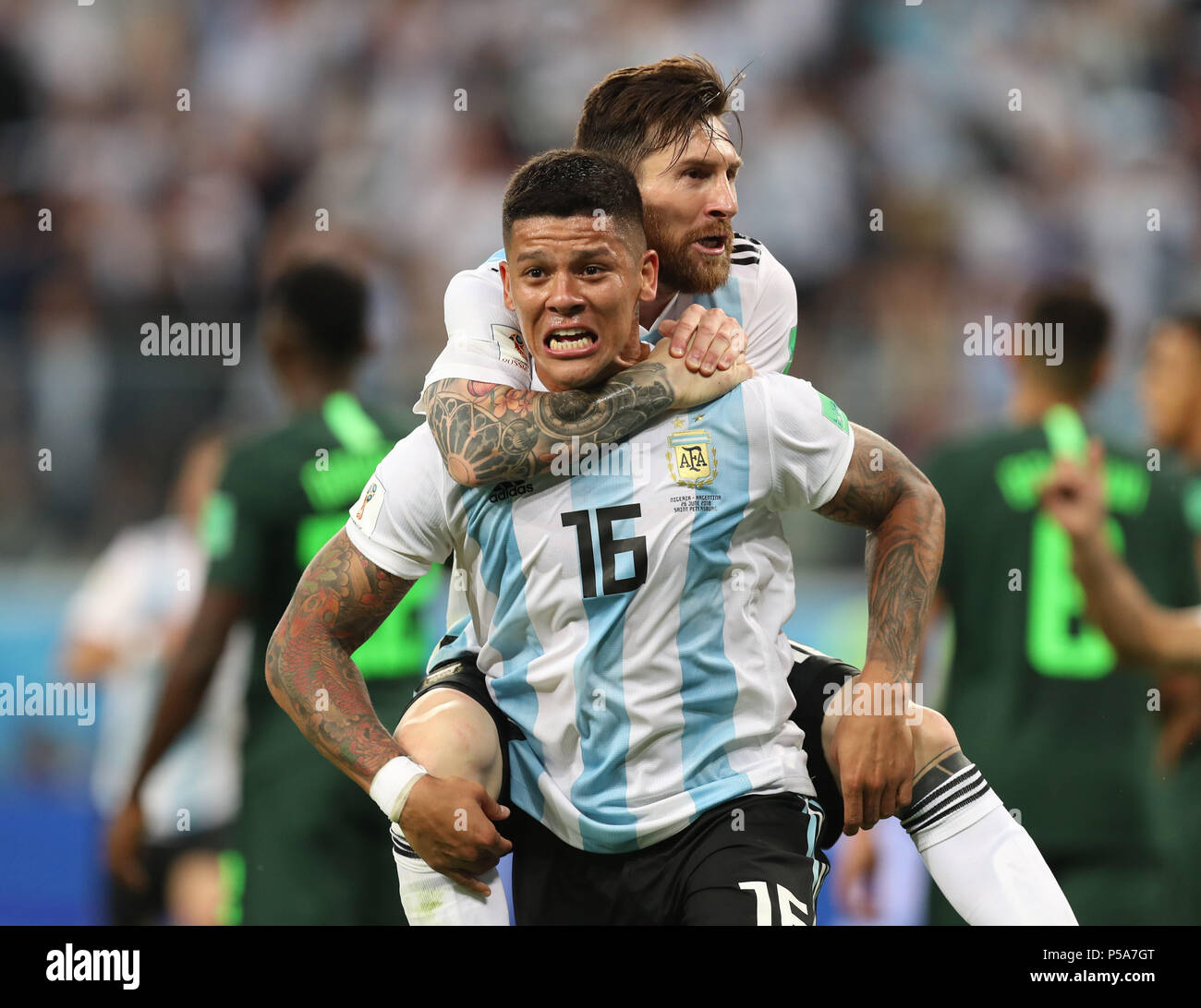 Saint Petersburg, Russia. 26th June, 2018. Argentina's Marcos Rojo (bottom) celebrates scoring with Lionel Messi during the 2018 FIFA World Cup Group D match between Nigeria and Argentina in Saint Petersburg, Russia, June 26, 2018. Credit: Yang Lei/Xinhua/Alamy Live News Stock Photo