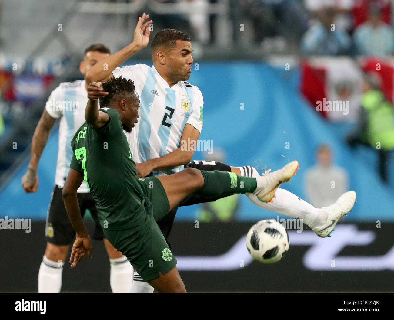 26 June 2018, Russia, Moscow: Soccer, World Cup 2018, Preliminary round, Group D, 3rd game day, Nigeria vs Argentina at the St. Petersburg Stadium: Argentina's Gabriel Mercado and Nigeria's Ahmed Musa (L) vie for the ball. Photo: Cezaro De Luca/dpa Stock Photo