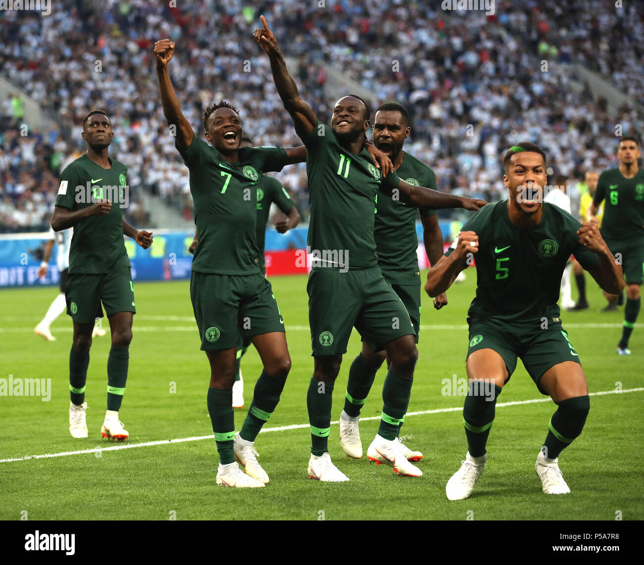 Saint Petersburg, Russia. 26th June, 2018. Victor Moses (C) of Nigeria celebrates scoring with teammates during the 2018 FIFA World Cup Group D match between Nigeria and Argentina in Saint Petersburg, Russia, June 26, 2018. Argentina won 2-1 and advanced to the round of 16. Credit: Wu Zhuang/Xinhua/Alamy Live News Stock Photo