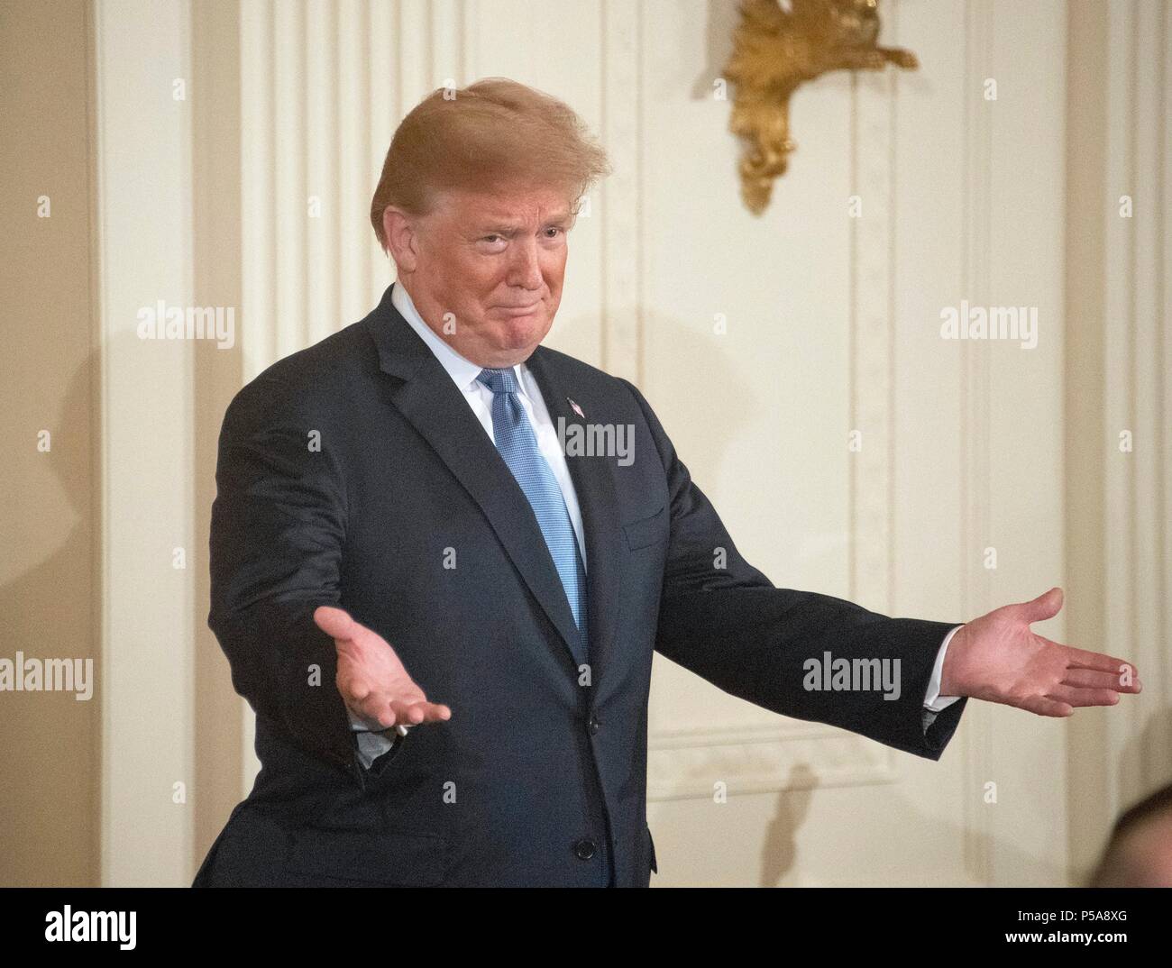 United States President Donald J. Trump hosts a ceremony to posthumously award the Medal of Honor to then-First Lieutenant Garlin M. Conner, U.S. Army, for conspicuous gallantry during World War II in the East Room of the White House in Washington, DC on Tuesday, June 26, 2018. Conner is being honored for his actions on January 24,1945, while serving as an intelligence officer with Headquarters and Headquarters Company, 3d Battalion, 7th Infantry Regiment, 3d Infantry Division. Credit: Ron Sachs/CNP | usage worldwide Stock Photo