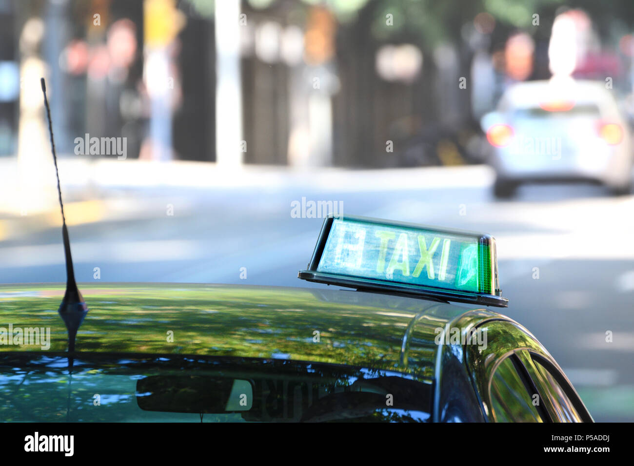 STRASBOURG, FRANCE - SEP 21, 2014: White Mercedes-Benz E Class taxi parked  on a rainy day in center of Strasbourg, place Kleber next to cafe Stock  Photo - Alamy