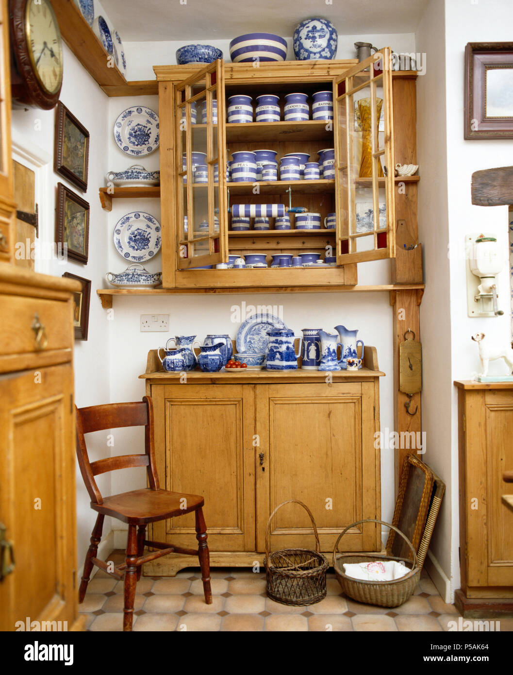 Collection of blue+white striped Cornishware on shelves in pine wall cupboard above old pine cupboard Stock Photo - Alamy Collection of blue+white striped Cornishware on shelves in pine wall cupboard above old pine cupboard Stock Photo - Alamy