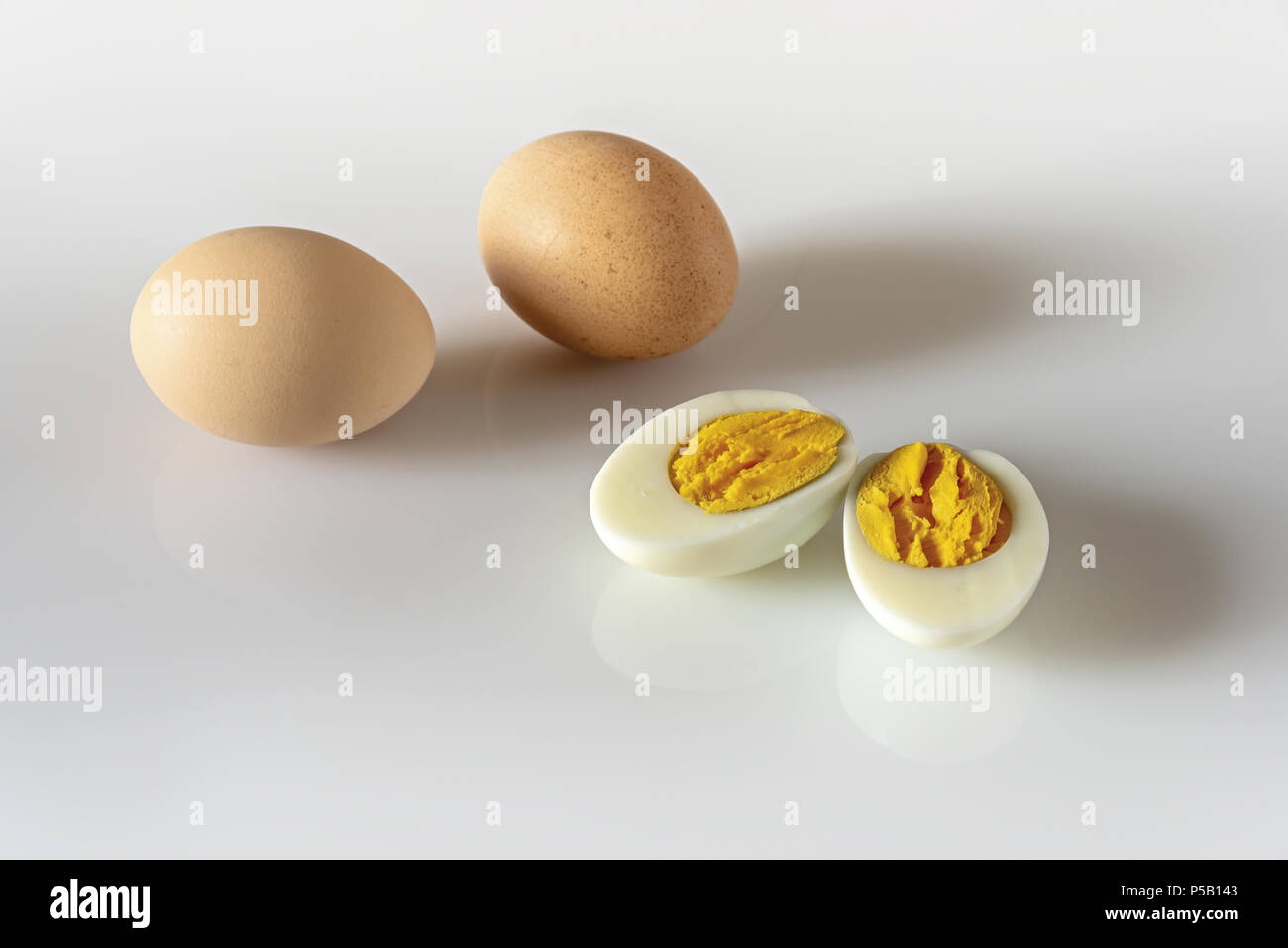 Two boiled eggs in a double egg cup Stock Photo - Alamy