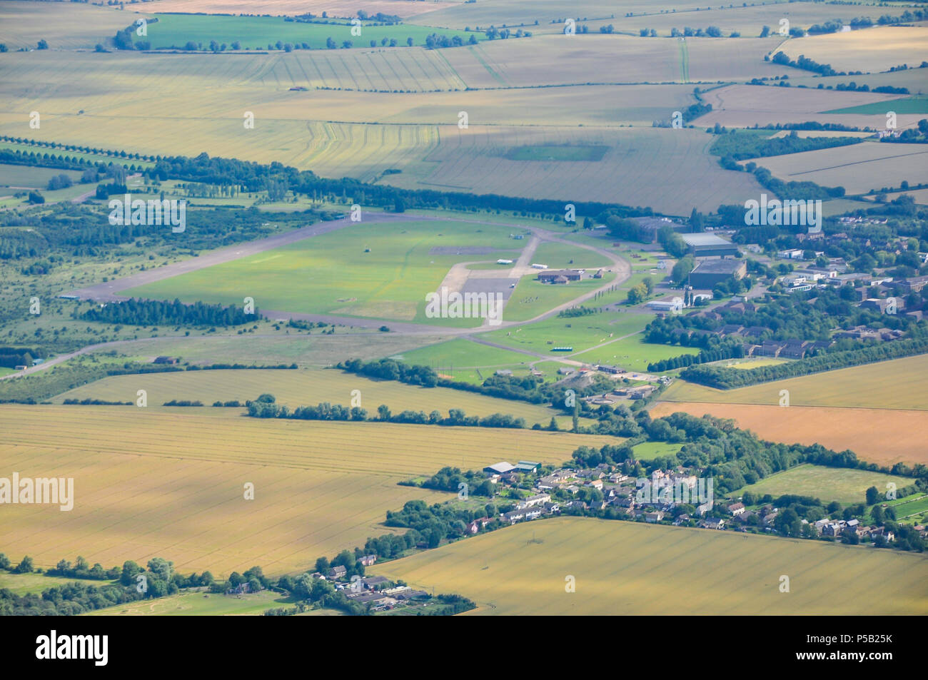 RAF Bassingbourn is a former Royal Air Force station located in Cambridgeshire. Aerial view showing airfield and surrounding areas Stock Photo