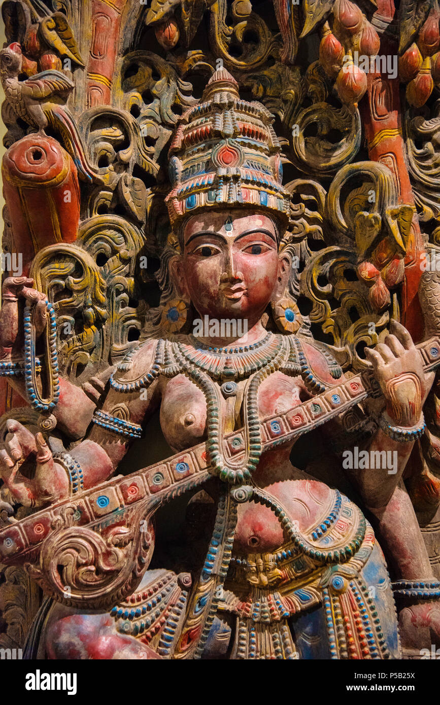 Wooden idol of Goddess Saraswati, Egmore, Chennai, India. Located at the Government Museum or Madras Museum Stock Photo