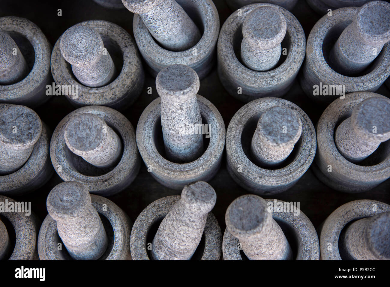 Black stone pestle and mortar, near Shore Temple, Mahabalipuram, Tamil Nadu Stock Photo Alamy