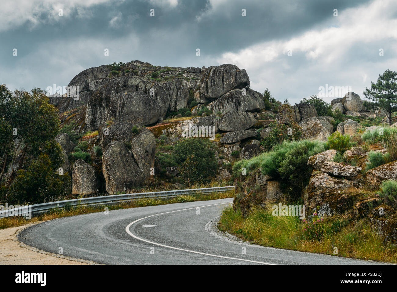 Empty mountainous road near the historic castle town of Sortelha in northeastern Portugal. Stock Photo