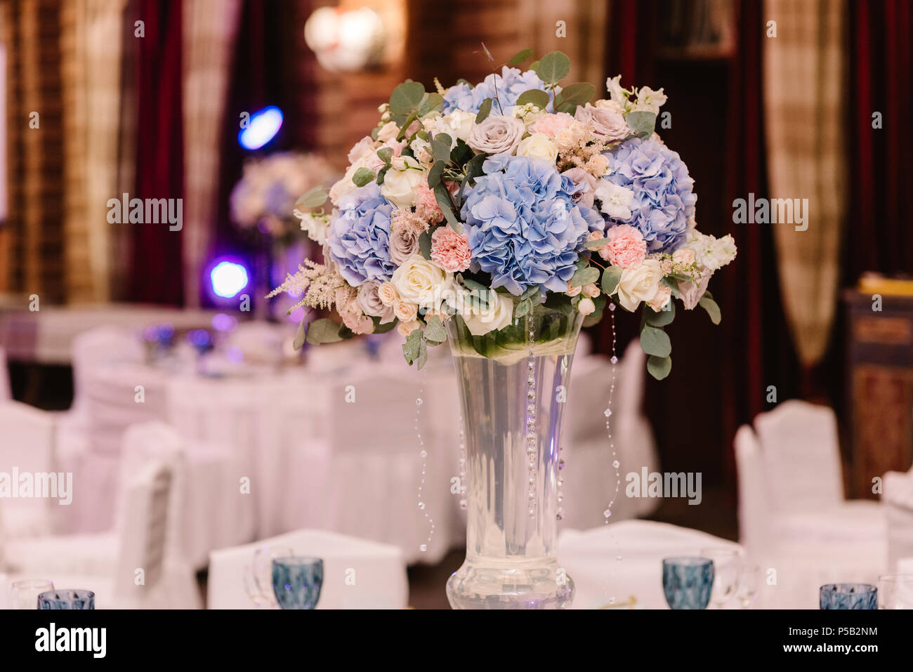 Magnificent Volume Bouquets Of Flowers In High Glass Vases