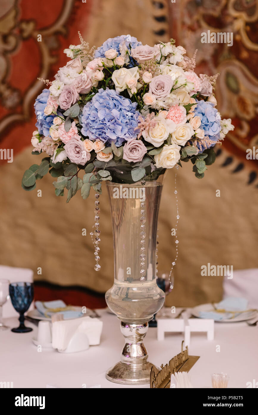 Magnificent Volume Bouquets Of Flowers In High Glass Vases