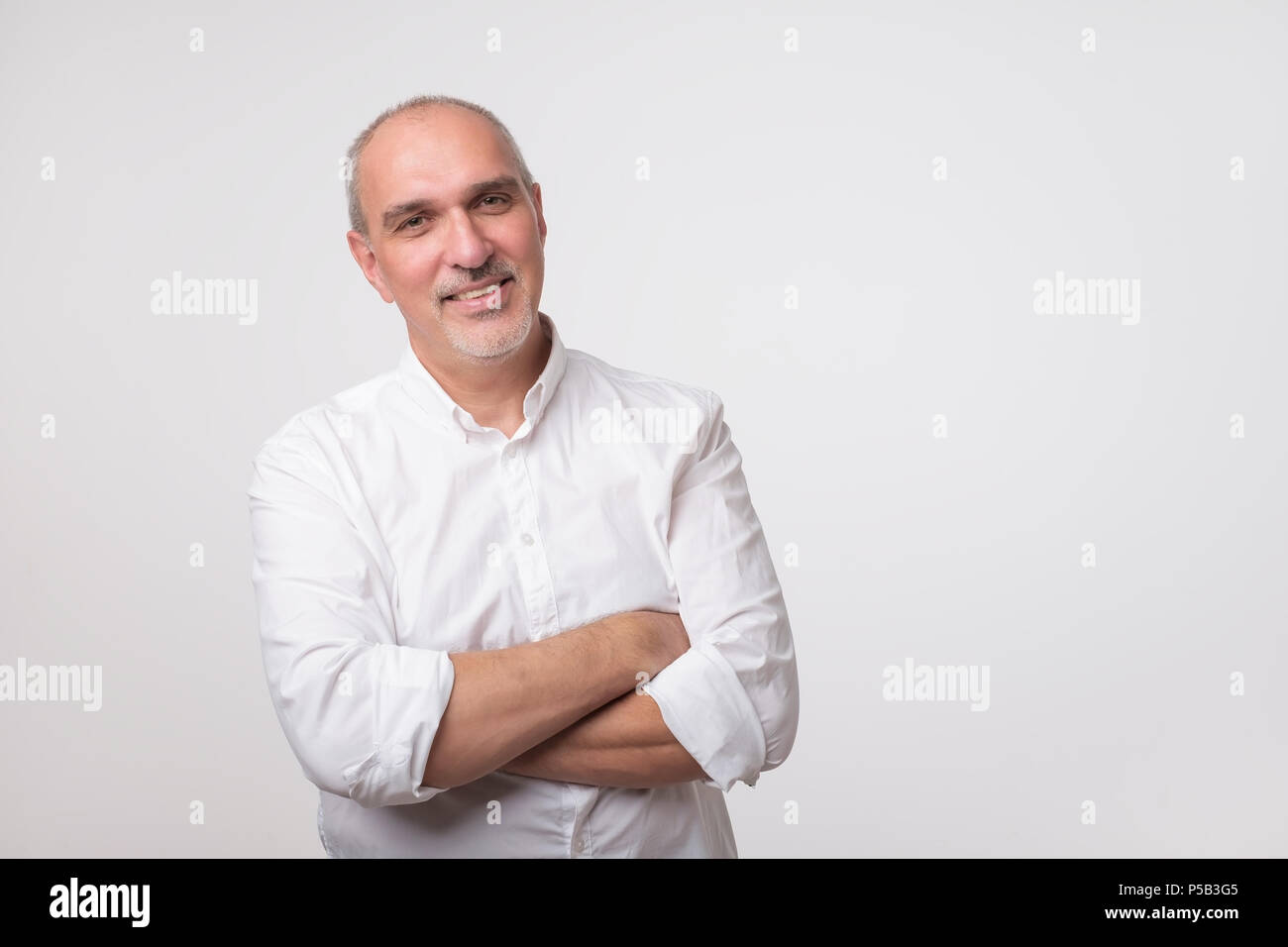Senior man white t shirt arms hi-res stock photography and images - Alamy