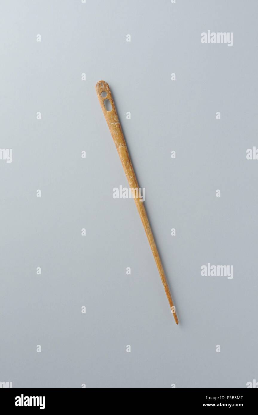 Sewing needle (Acus Anis) with two holes of bone. Length 109 mm Width of  head 6 mm Thick 1 to 2 mm ( 2nd - 3 rd CE ) Roman period, from