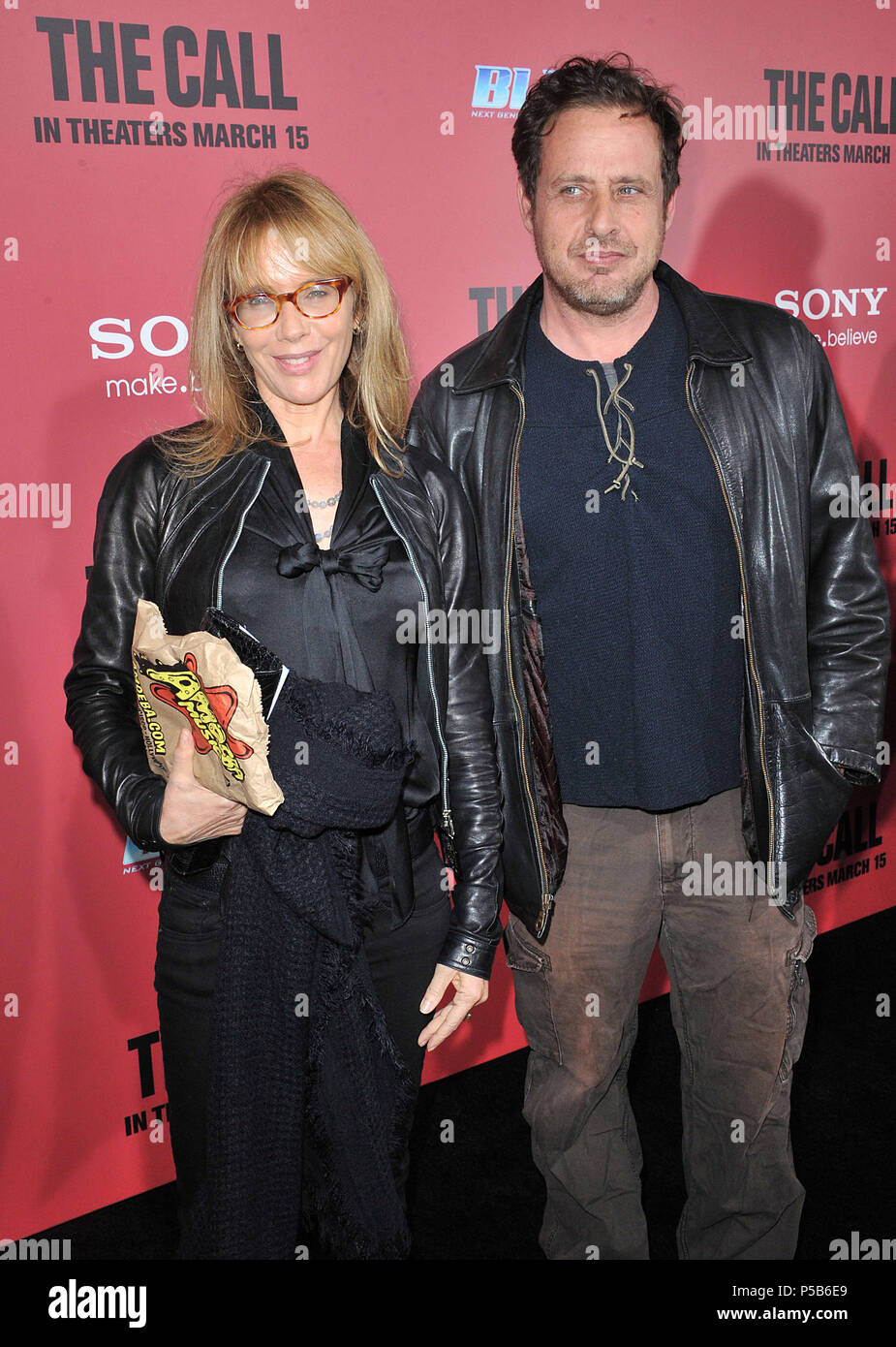 Rosanna Arquette and friend at The Call Premiere at the Arclight Theatre In Los Angeles.Rosanna Arquette and friend ------------- Red Carpet Event, Vertical, USA, Film Industry, Celebrities,  Photography, Bestof, Arts Culture and Entertainment, Topix Celebrities fashion /  Vertical, Best of, Event in Hollywood Life - California,  Red Carpet and backstage, USA, Film Industry, Celebrities,  movie celebrities, TV celebrities, Music celebrities, Photography, Bestof, Arts Culture and Entertainment,  Topix, vertical,  family from from the year , 2013, inquiry tsuni@Gamma-USA.com Husband and wife Stock Photo