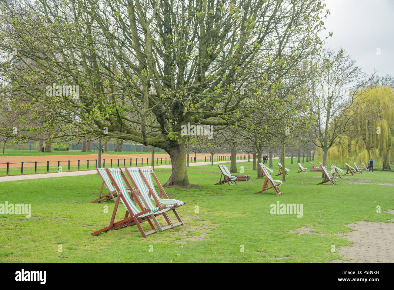 Park deck chairs in Hyde Park at London, United Kingdom Stock Photo - Alamy