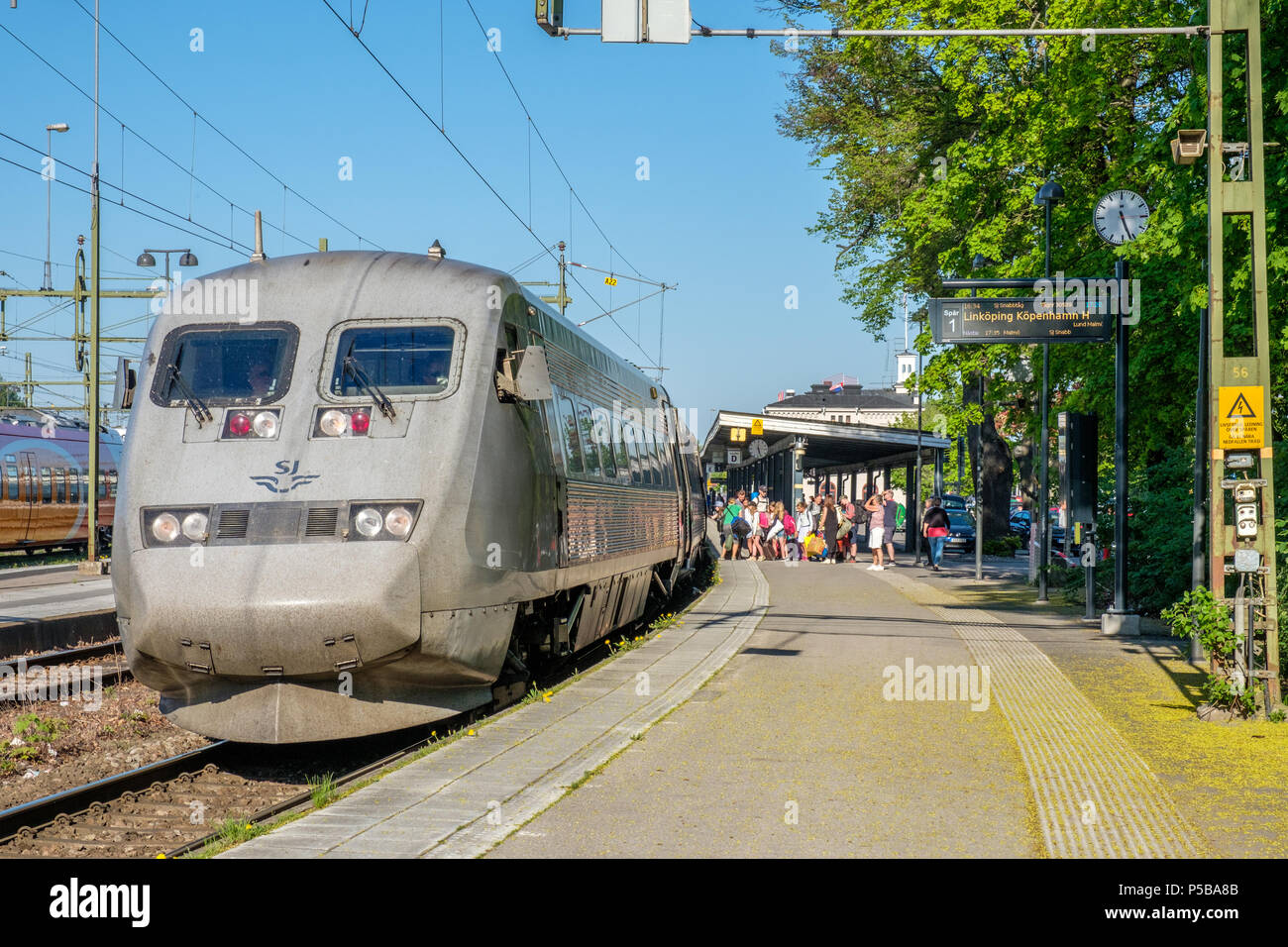 High-speed inter-city train between Stockholm and Copenhagen stopping at Norrkoping Central Station. Stock Photo