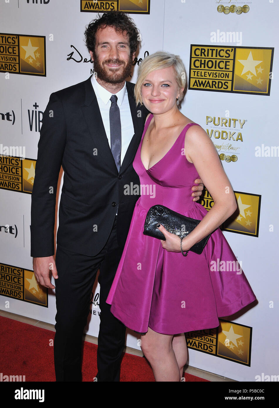 Elisabeth Moss, Thomas M. Wright arriving at Broadcast Tel. Awards 3rd  Critic s Choice at the Beverly Hilton Hotel in Los Angeles.Elisabeth Moss,  Thomas M. Wright 135 ------------- Red Carpet Event, Vertical,