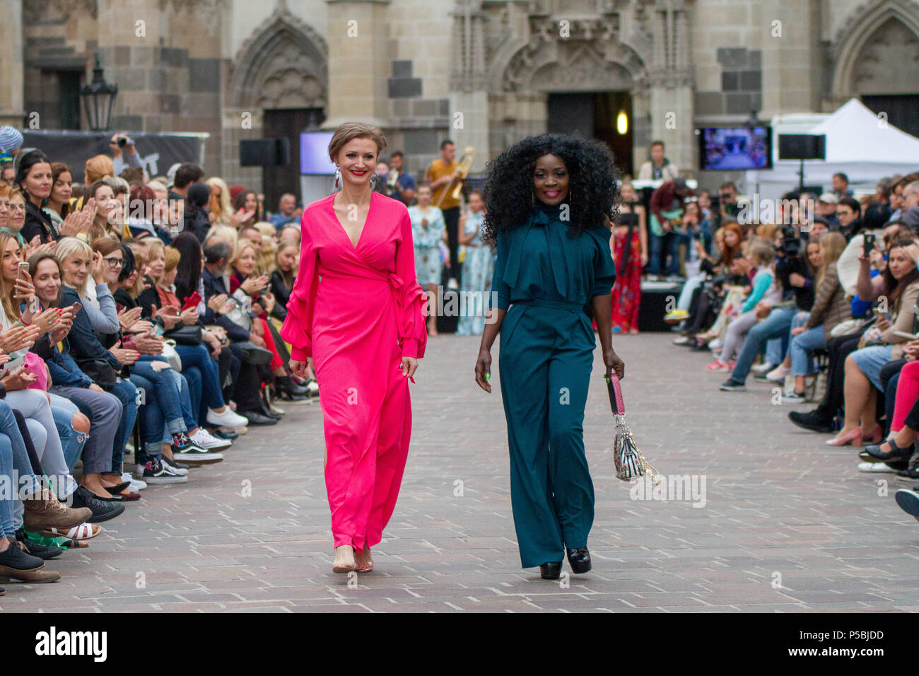 Fashion designer Zuzana Hakova and American singer Nicole Mccloud at a  fashion show in the historic centre of Kosice Stock Photo - Alamy