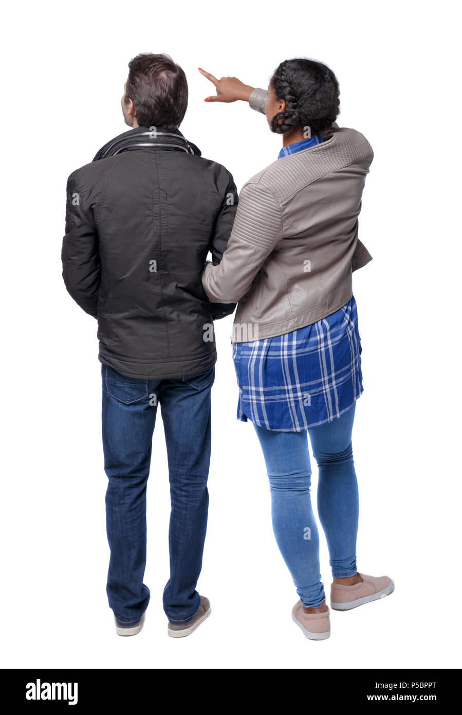 Back view of the interracial who hugs and points out. Rear view people ...