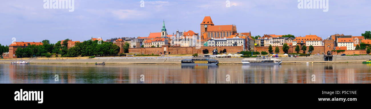 Torun, Kujavian-Pomeranian / Poland - 2018/06/10: Panoramic view of historical district of Torun old town by the Vistula river Stock Photo