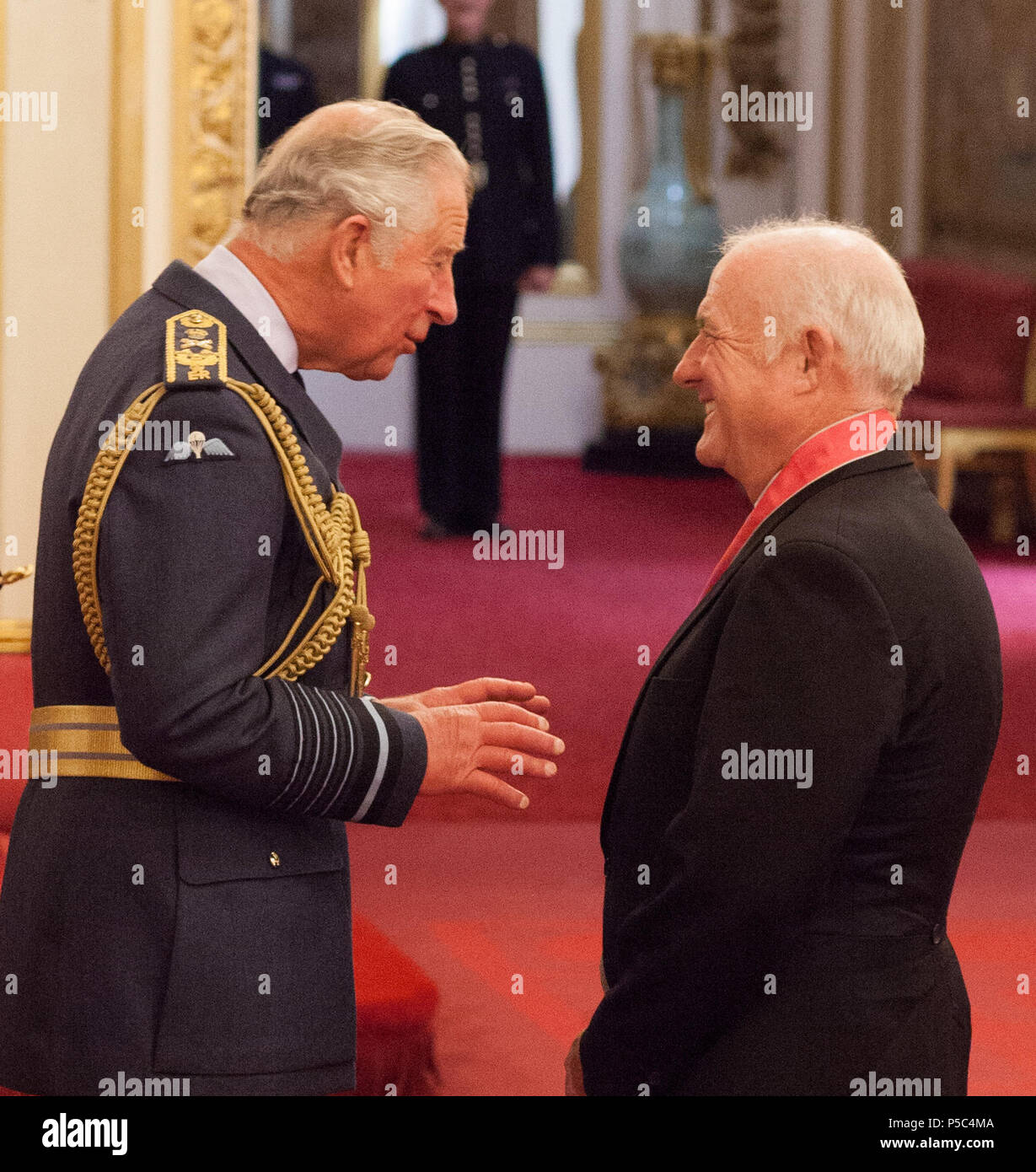 Chef Rick Stein is presented with a CBE (Commander of the Order of the British Empire) by the Prince of Wales during an Investiture ceremony at Buckingham Palace, London. Stock Photo