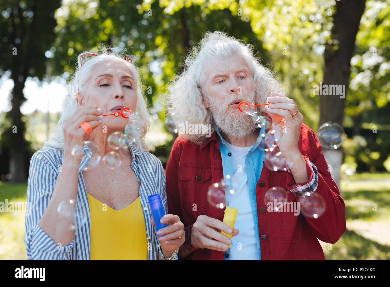 Pleasant aged people having fun Stock Photo - Alamy