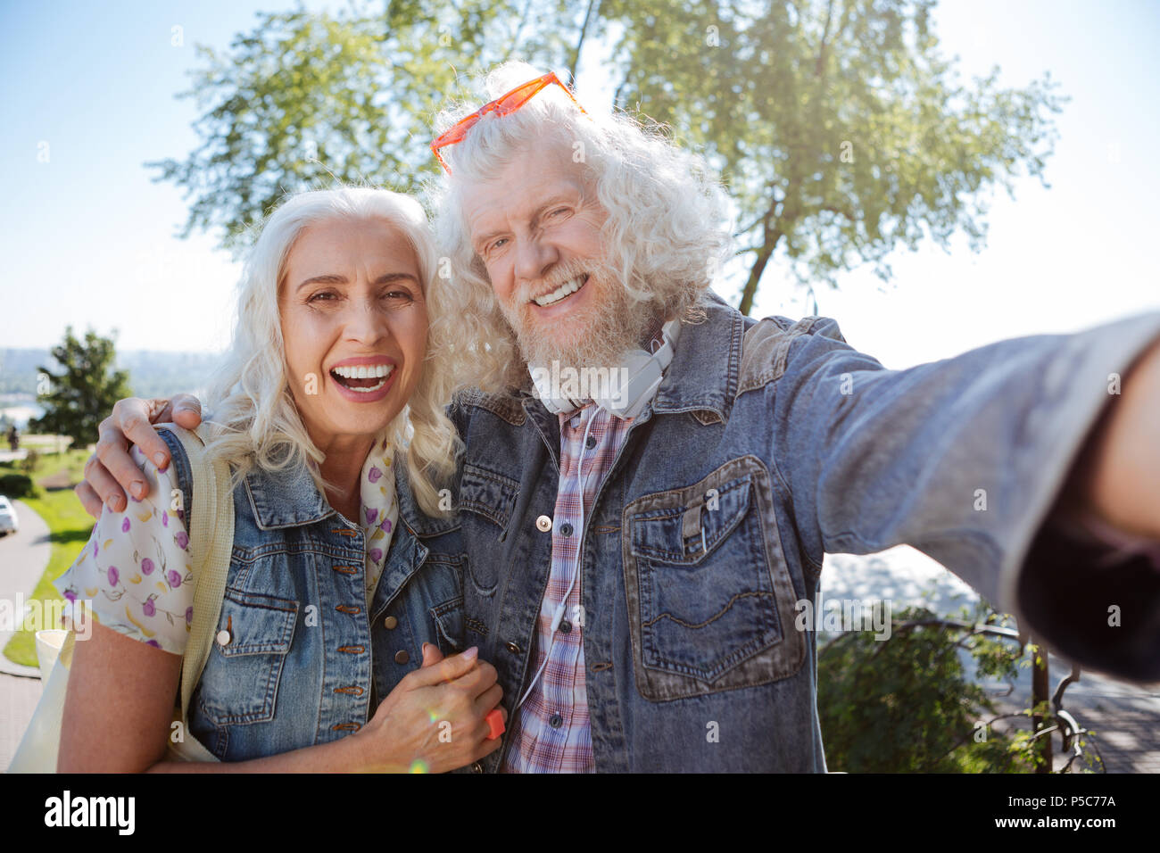 Happy elderly couple taking selfies Stock Photo